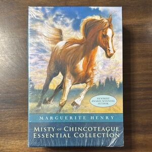 Brown and Blue Coffee Table Book with Horse Imagery